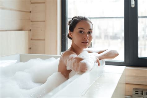 Beautiful Young Woman In Bathtub With Foam The Local Realty