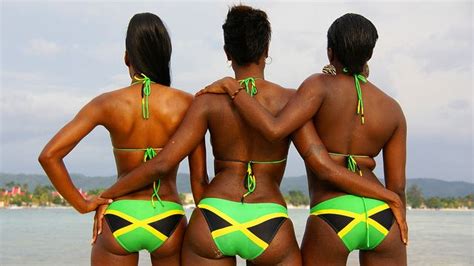 three jamaican girls wearing bikinis with the jamaica flag design jamaican girls summer