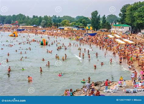 Crowds Of People Relaxing On Black Sea Sandy Beach In Anapa Seaside