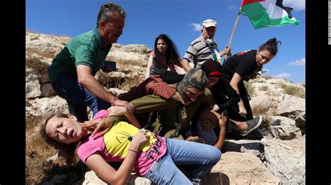 Israeli synonyms, israeli pronunciation, israeli translation, english dictionary definition of israeli. Images show Israeli soldier handling Palestinian boy - CNN