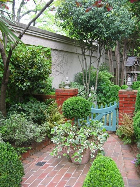 Courtyard Garden With Gate Comes With Brick Pathway And Middle Clay