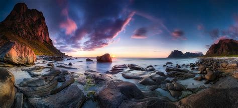 Online Crop Rock Mountains Surrounded By Body Of Water Long Exposure