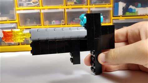 How to build a lego nerf gun (that works). LEGO gun - Tutorial - YouTube
