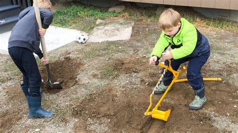 Big Dig Ride On Crane Kids Digging Up The Back Yard With A Shovel And A