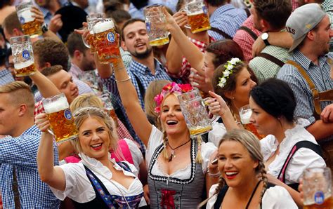 oktoberfest 2016 sees beer flooding britain as revellers raise their steins in celebration of