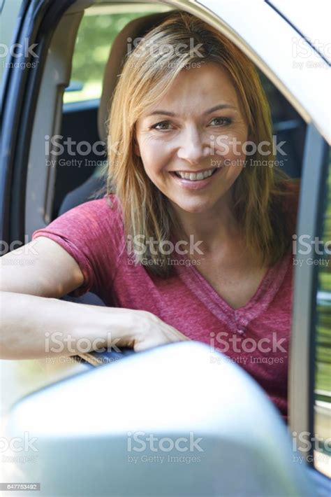 Portrait Of Mature Woman Driving Car Stock Photo Download Image Now