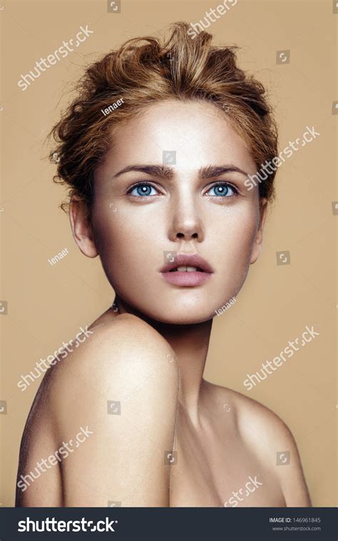 Portrait Of Beautiful Woman With Nude Make Up Stock Photo