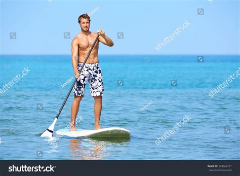 Stand Up Paddle Board Man Paddleboarding On Hawaii Standing Happy On