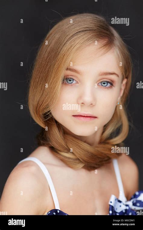 Attractive Young Girl With Blu Eyes Stock Photo Alamy