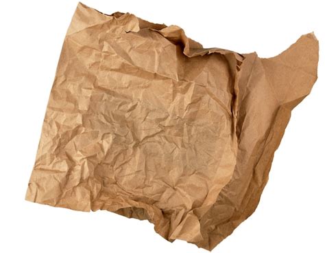 Premium Photo Crumpled Piece Of Brown Paper Isolated