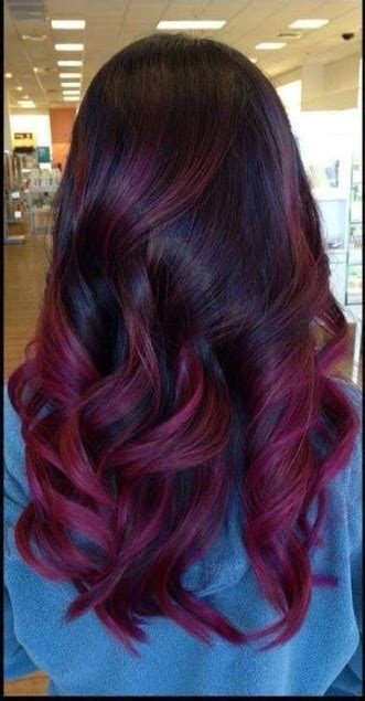 This luscious dark plum hair color melted into a lighter gray hue has us begging for more photos. Dark Brown Hairstyles With Plum Highlights