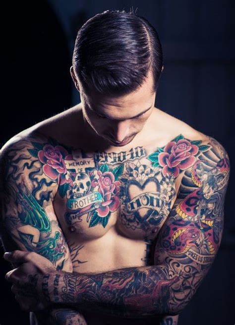 Here, rose flowers are drawn to the left shoulder. Rose Tattoo designs Inspiration - Mens Craze
