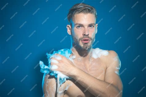 premium photo muscular bearded hipster washes in shower handsome naked unshaven man taking
