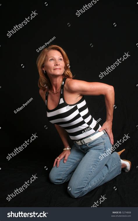 Pretty Mature Woman Kneeling Down Stock Photo Shutterstock