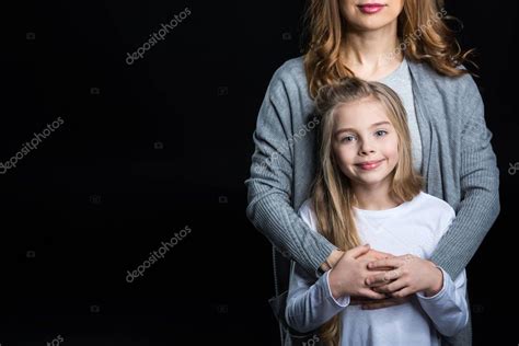 Mother And Daughter Embracing — Stock Photo © Igortishenko 137215776