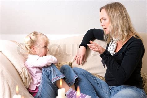 A Caucasian Mother Telling A Story To Stock Image Colourbox