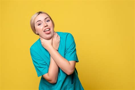Free Photo Front View Of Young Female Doctor In Medical Shirt Choking