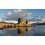 Scotland Castle UK Eilean Donan Clouds Lake Bridge Reflection 