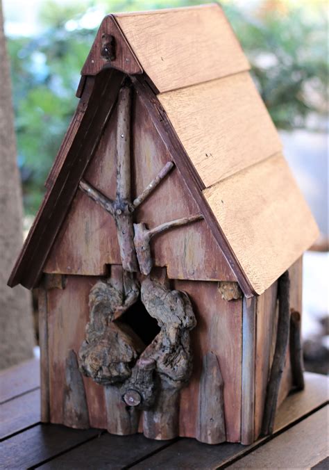 A Birdhouse With A Burl Entrance Beautiful Birdhouses Bird Houses