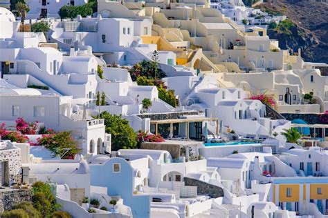 Traditional White Buildings Facing Aegean Sea In Oia Santorini Island