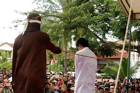 Two Men Caned For Gay Sex In Indonesia