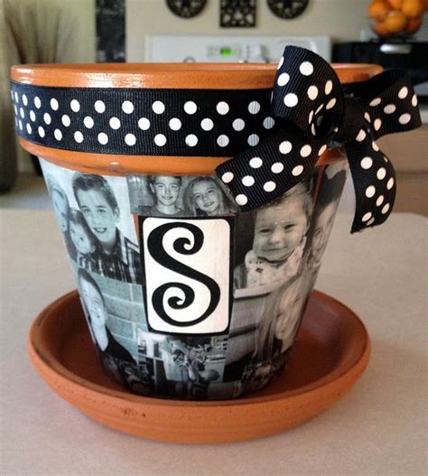 Make a tiered planter from terra cotta saucers. Bathroom Decor Ideas: Mod podge & pics on terra cotta pots....