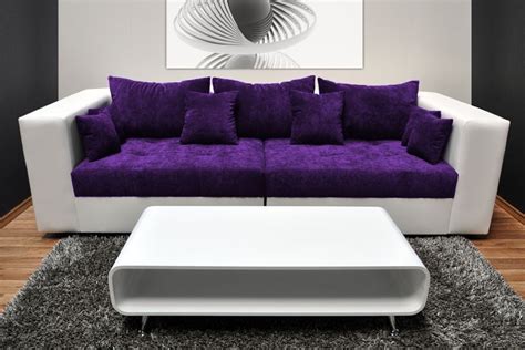Living room with purple furniture and teal shag rug. Purple Sofa Set | Couch & Sofa Ideas Interior Design - sofaideas.net