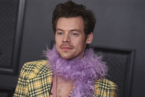 harry styles concert fashion looks include feathers heels and glitter footwear news