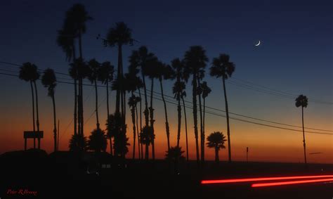 Sunset with the new moon chancing him Malibu California | Malibu ...
