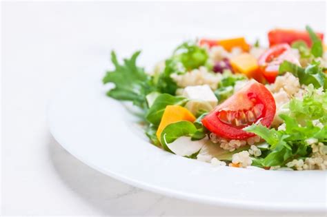 Free Photo Salad On A White Plate