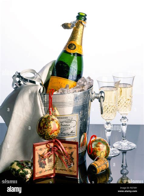 Veuve Clicquot Champagne In Ice Bucket With Christmas Decorations And