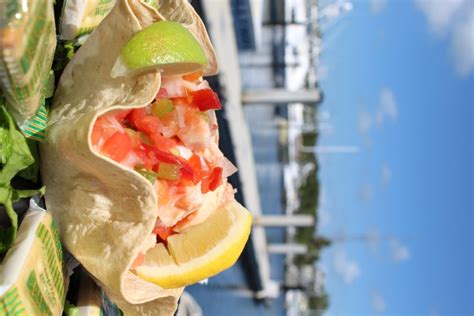 View ratings, photos, and more. Dock to dinner - Key Largo Fisheries Backyard Café a ...