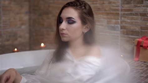 Portrait Of Beautiful Woman In White Shirt Taking A Bath Cute Girl