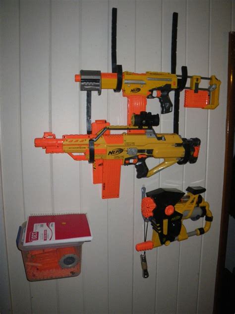 I saw this online and his friend has a similar rack for nerf. Diy Nerf Gun Wall Rack - Easy Removable Dorm Nerf Blaster ...