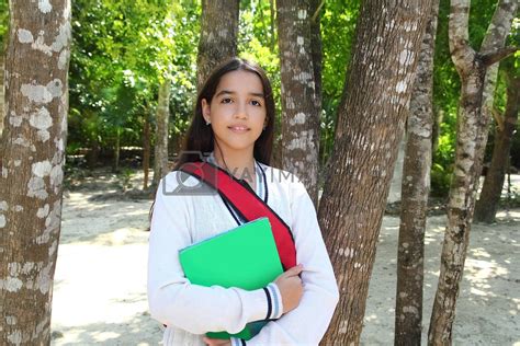 hispanic latin teenager girl backpack in mexico park by lunamarina
