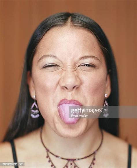 Female Sticking Out Tongue Close Up Photos Et Images De Collection Getty Images