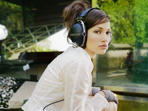 A Woman Wearing Headphones Headphone Reviews And Discussion Head