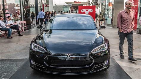 tesla stock faces    potential threat analyst cbnc