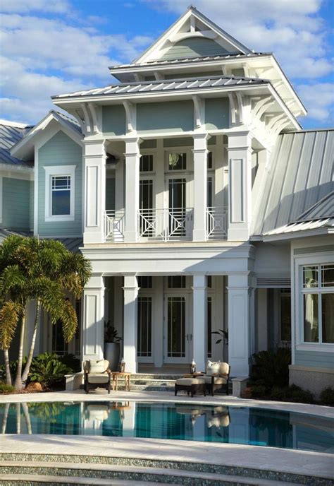 Colonial style homes are named as such because they were built by colonists who based this style of home lends itself to playing with vivid colors. Home with a coastal chic vibe offers relaxed living on Davis Island, Florida in 2020 | Best ...