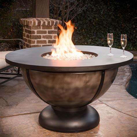 We reviewed the best propane fire pits & fire tables for 2020. 90,000 BTU Round Propane Gas Fire Table - OUTDOOR FIRE ...