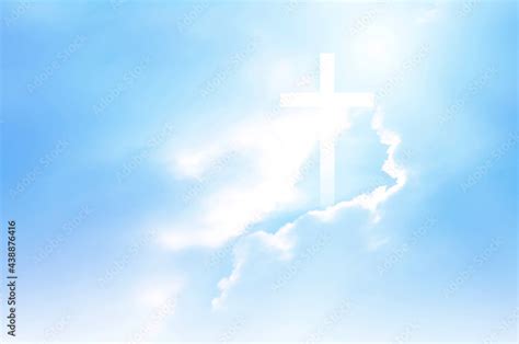 Christian Cross Appears Bright In The Sky Background And Soft Clouds