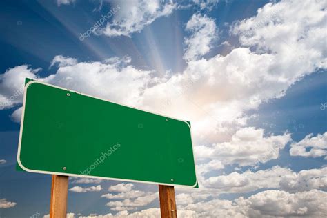 Blank Green Road Sign Over Dramatic Sky — Stock Photo © Feverpitch 3187104