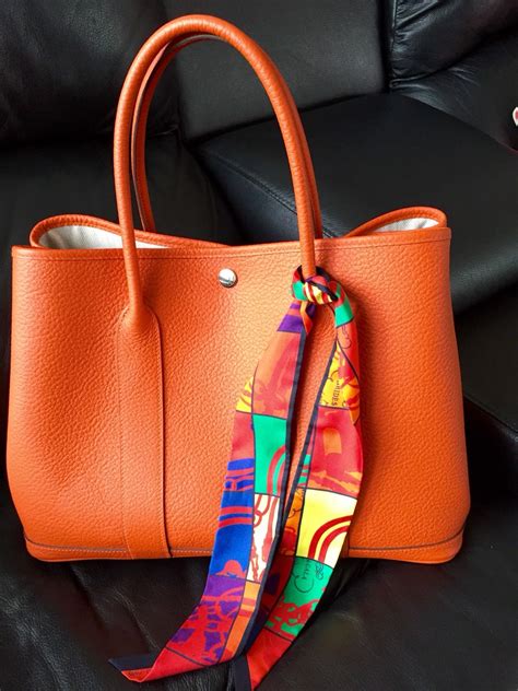 Also, the authentic bag has a slight indented contour above the seam, which is missing from the fake bag. Garden Party Hermes bag with mini twilly | Hermes handbags ...
