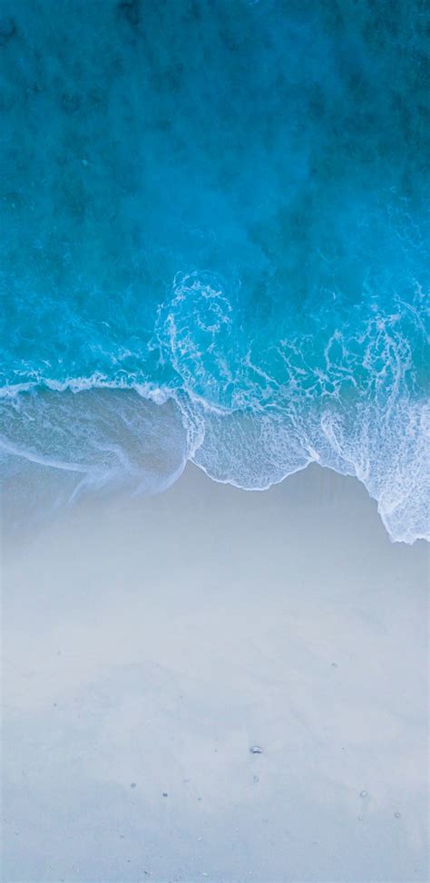 Download Wallpaper 1440x2960 Beach Sea Shore Blue Water Sea Waves