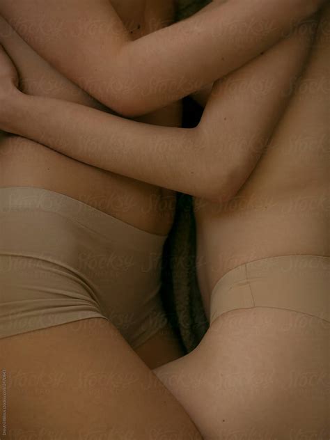 Two Lesbian Girls Hug Naked Without A Face By Stocksy Contributor