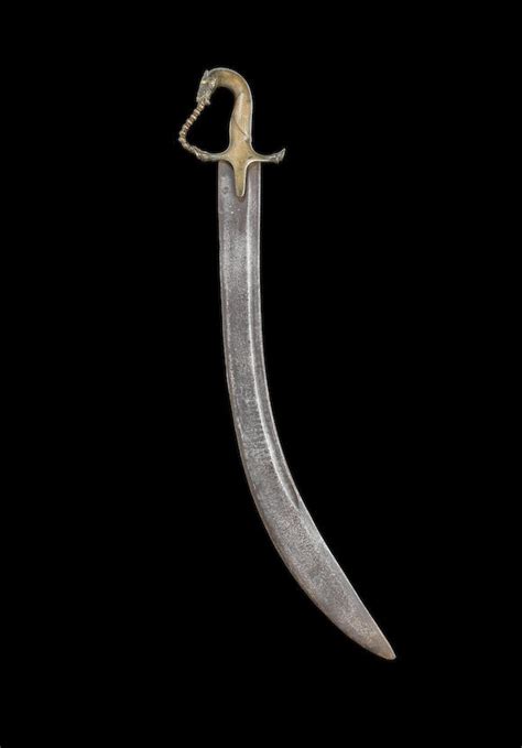 bonhams an unusual brass hilted steel sword india 18th century