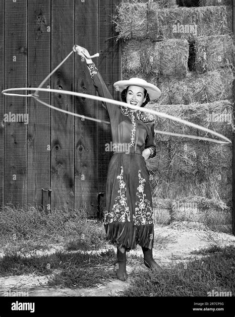 Hollywood California C 1954 Actress Ann Blyth Shows Off Her Cowgirl Rope Spinning Skills