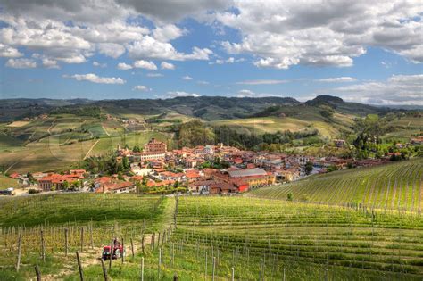 Aerial View On Town Of Barolo Among Hills And Vineyards Of Piedmont