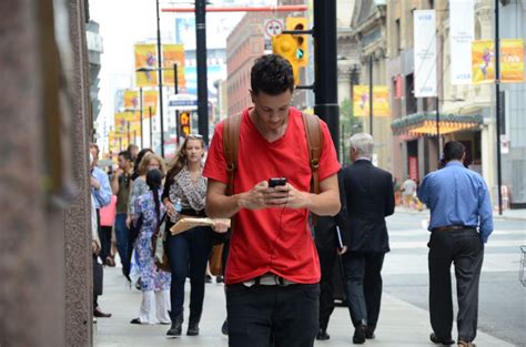 Toronto Mpp Wants To Fine People Who Cross The Street While Using Their Phones Iphone In