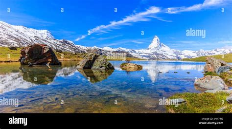 Beautiful Panoramic Summer View Of The Stellisee Lake With Reflection